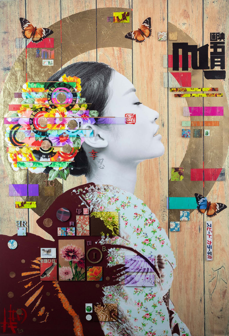 Artist Gareth Tristan Evans sits casually in a red armchair, reading a magazine in front of one of his vibrant mixed-media artworks featuring a female portrait with colourful abstract elements.